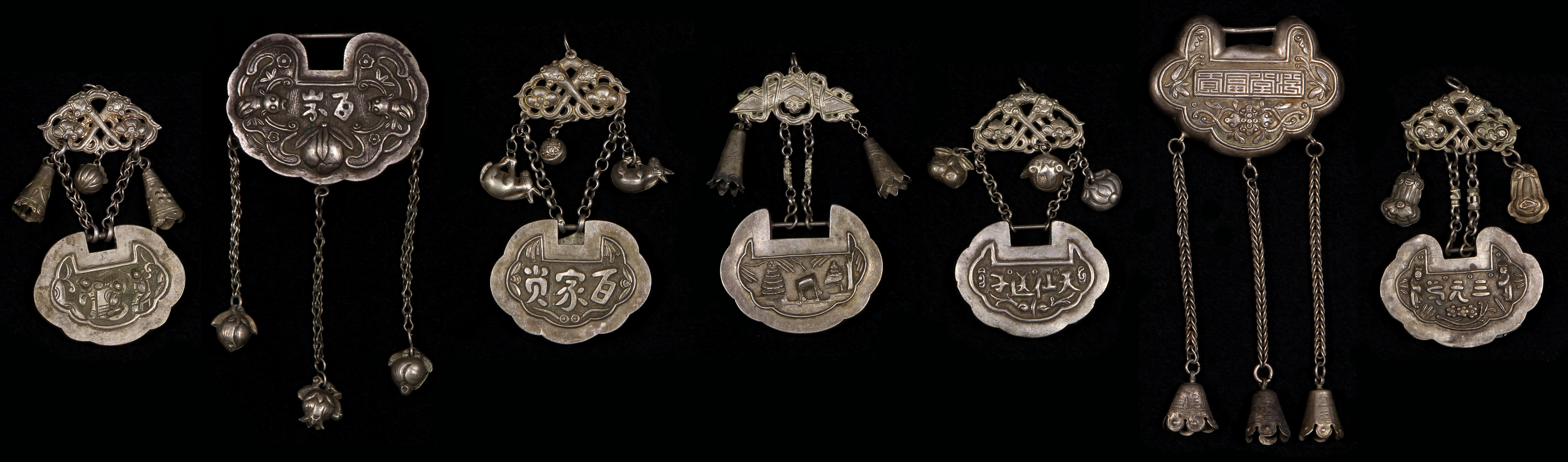 Chinese silver 'ruyi locks',